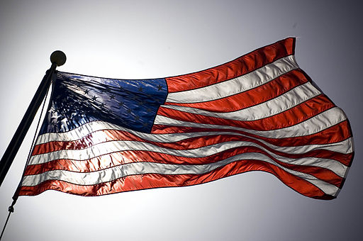512px-US_Navy_060417-N-8157C-162_The_American_flag_flies_prominently_during_the_World_Patriot_Tour_performance_at_Hickam_Air_Force_Base